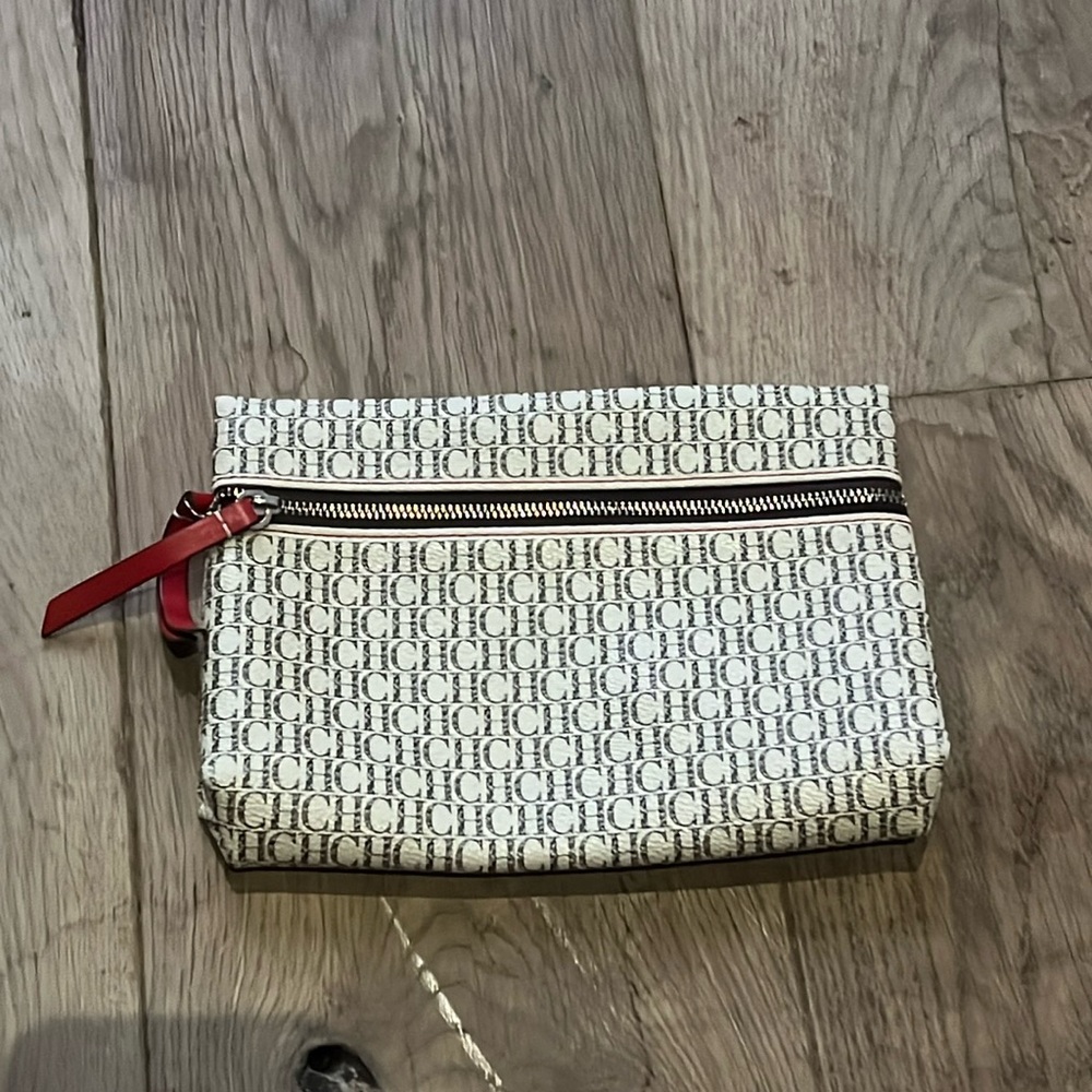 Carolina Herrera Beige Logo Print Wristlet with Red Pull